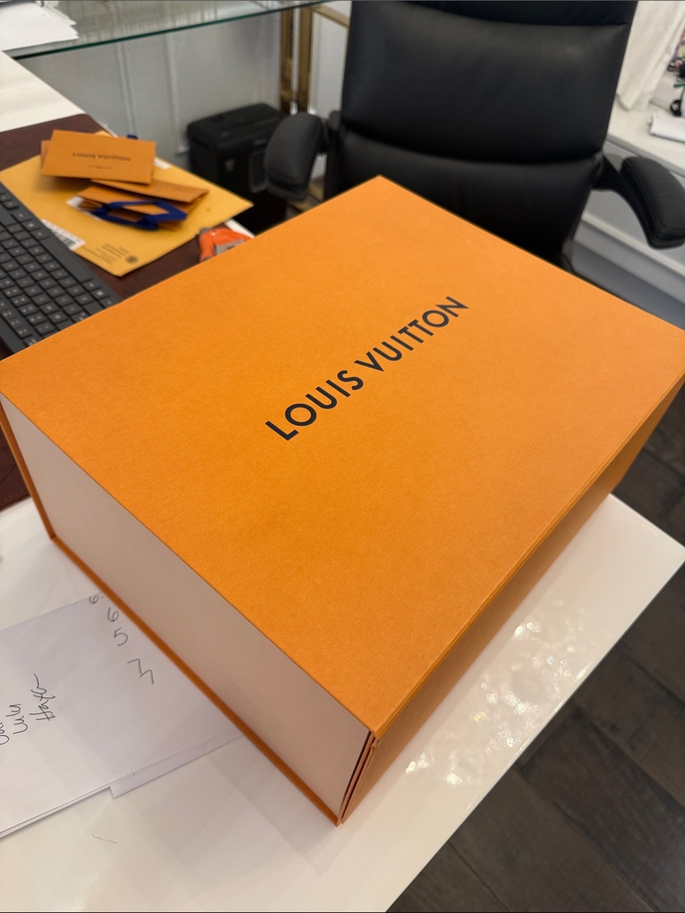 Authentic Louis Vuitton foldable Orange Storage Box with Black Logo